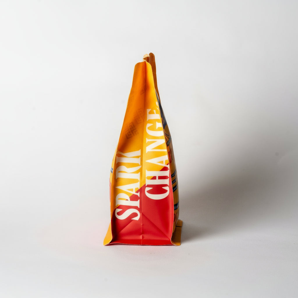 Fire Lily Spark Change on package with text on a white background