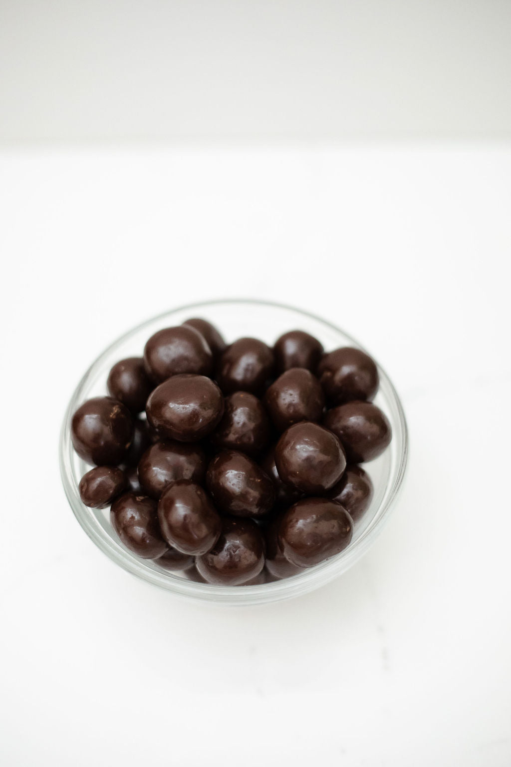 Kenyan Macadamia nuts enrobed with 72% Ecuador Dark Chocolate - Subscription