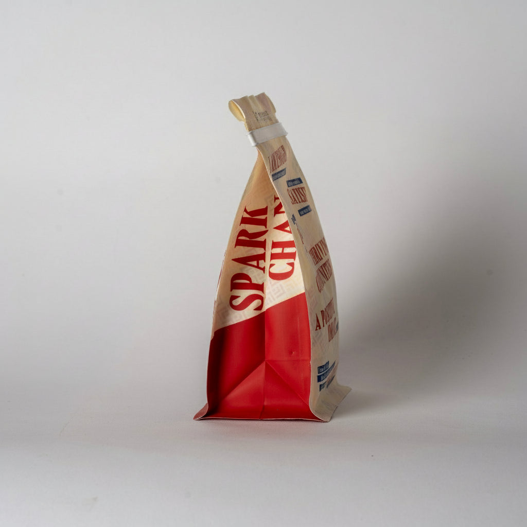 Macadamia nuts bag with 'Spark' branding on a white background